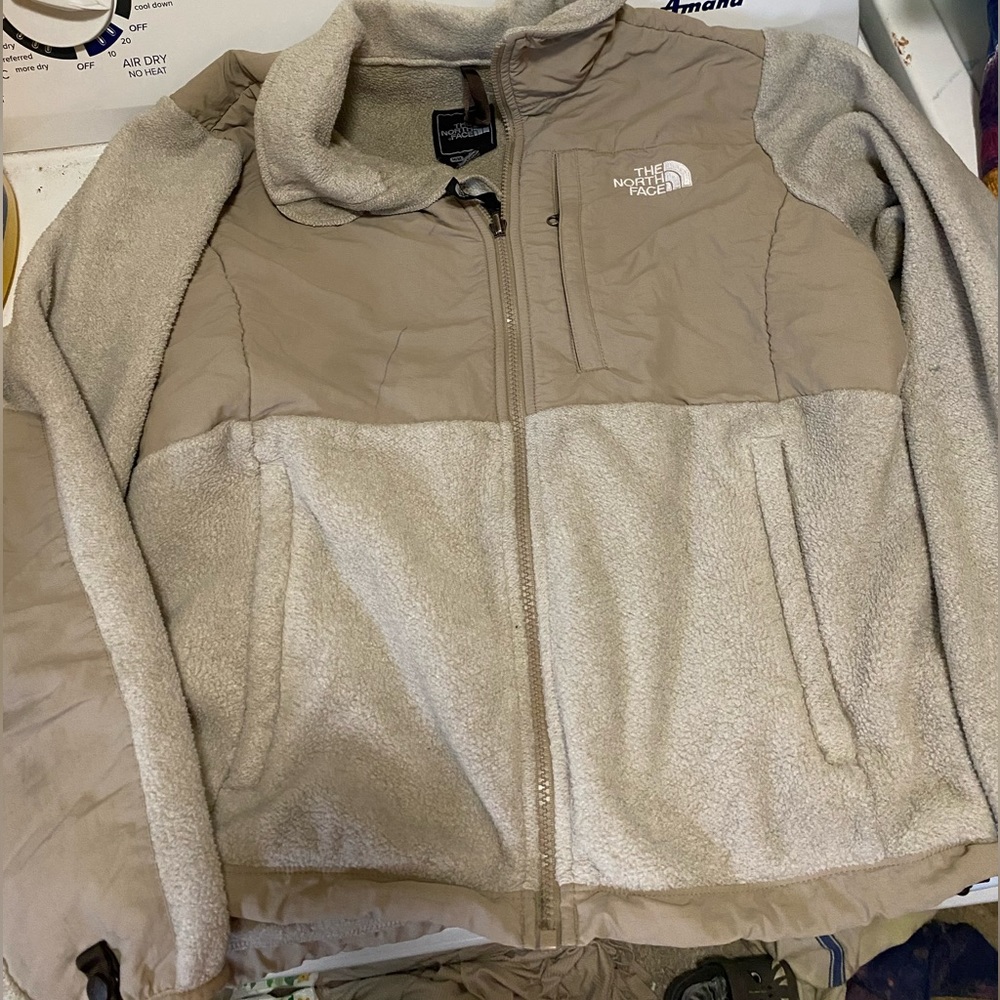 The north face tan sweatshirt.